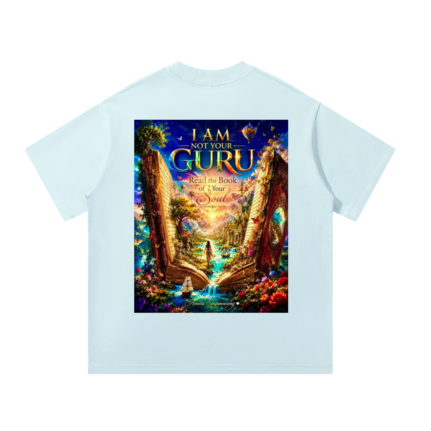 Light blue t-shirt with a colorful graphic design on the back featuring an open book and nature elements.