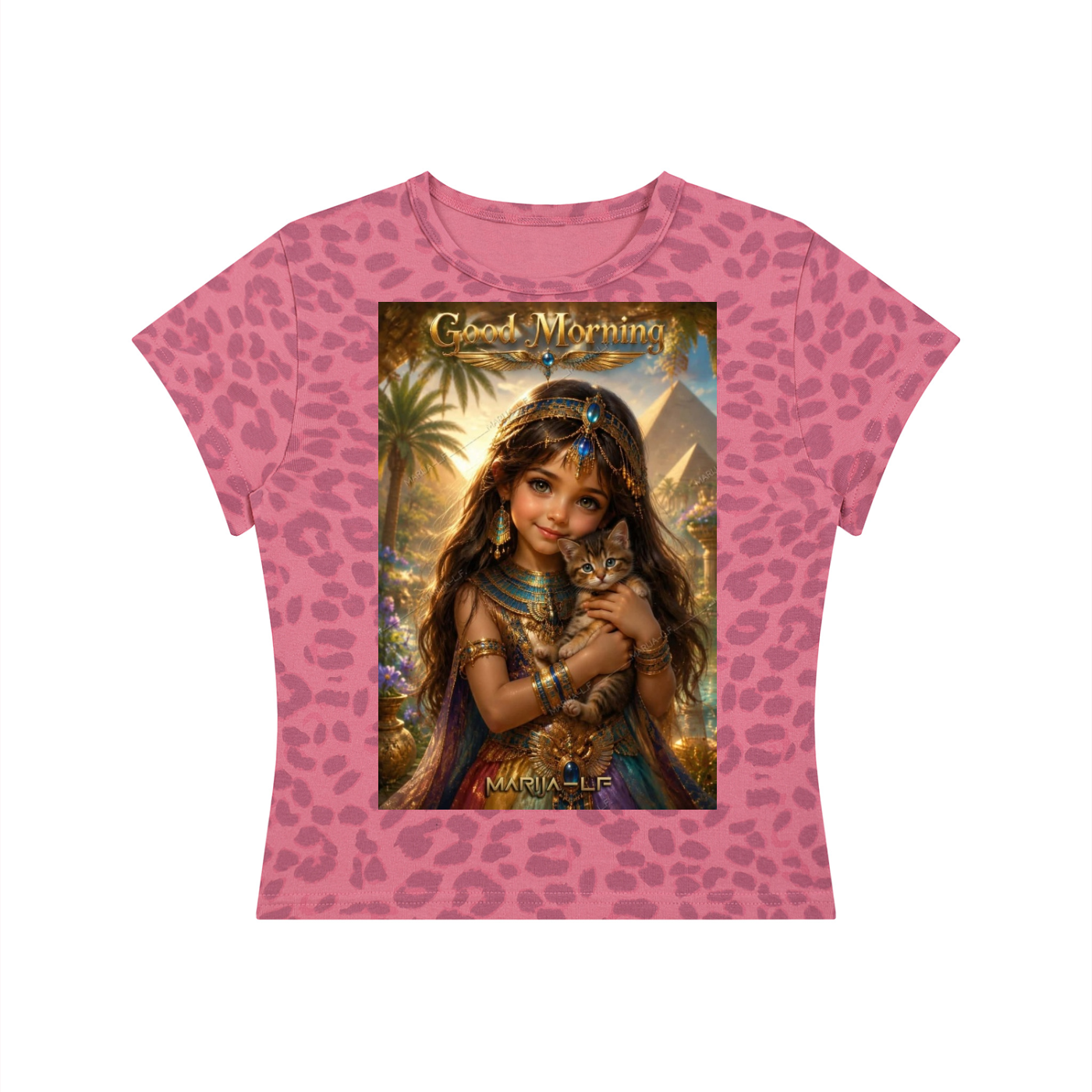 A pink short-sleeve t-shirt with a leopard print pattern, featuring a large central graphic print of an Egyptian goddess holding a cat with the text 'Good Morning' and 'MARIA-LE'.