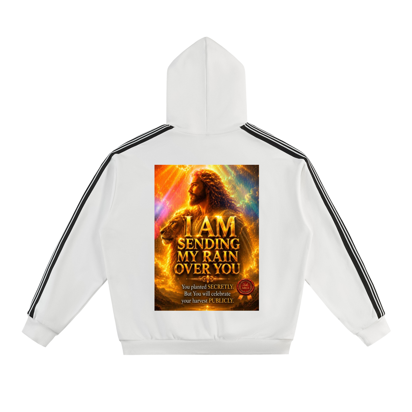 White pullover hoodie shown from the back, featuring black double stripes down the sleeves and a large rectangular graphic print in the center with a fiery portrait and the text 'I AM SENDING MY RAIN OVER YOU'.