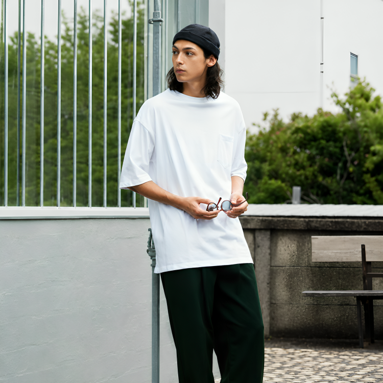 Streetwear outfit styling guide featuring bold graphic tees and oversized silhouettes from Planetary Design