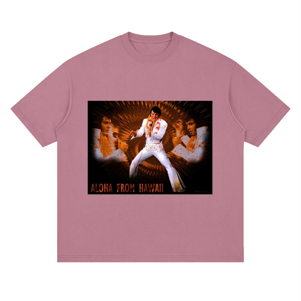 Pink t-shirt with a graphic of Elvis Presley and 'Aloha from Hawaii' text on a white background