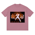 Pink t-shirt with a graphic of Elvis Presley and 'Aloha from Hawaii' text on a white background