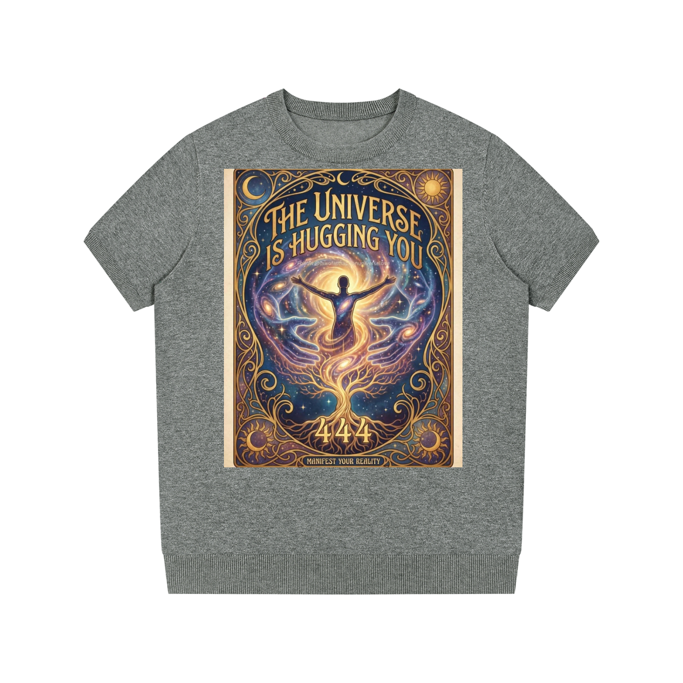 A heather gray crewneck t-shirt featuring a large, colorful graphic print on the front. The graphic is an illustration of a glowing figure embracing a cosmic tree of life with the text 'THE UNIVERSE IS HUGGING YOU' and '444' written below it.