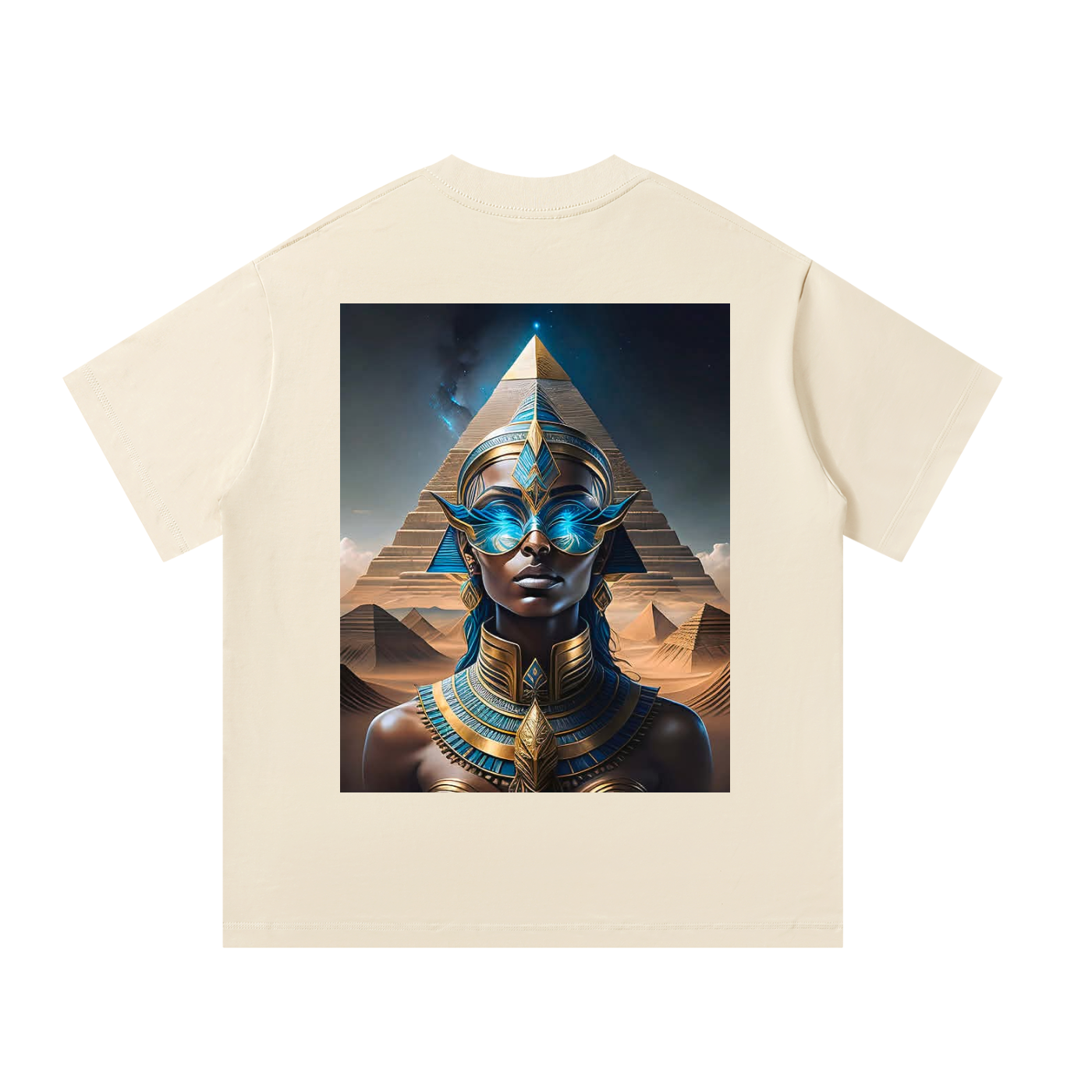 Beige t-shirt with a graphic of an Egyptian-themed design featuring a person in front of pyramids.