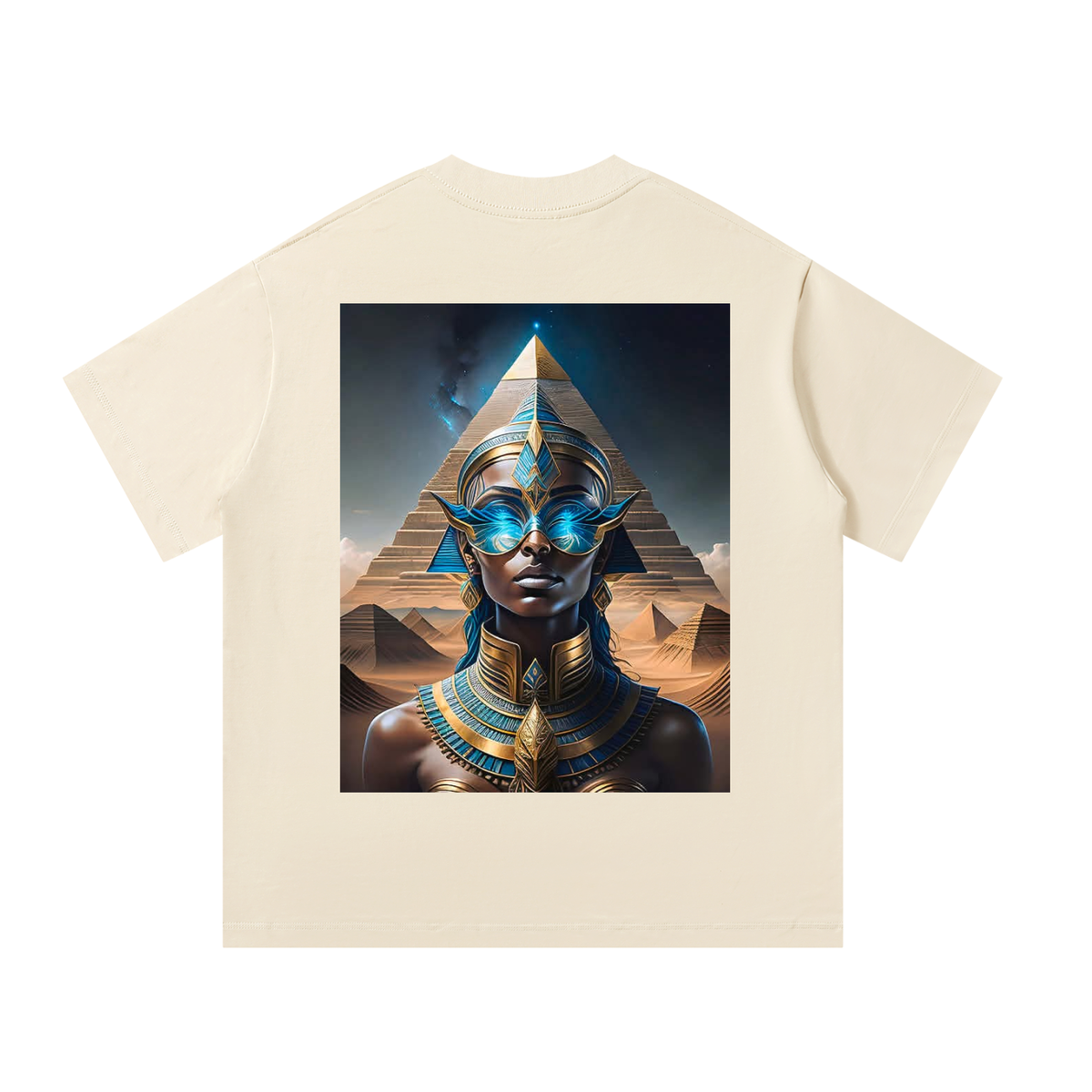 Beige t-shirt with a graphic of an Egyptian-themed design featuring a person in front of pyramids.