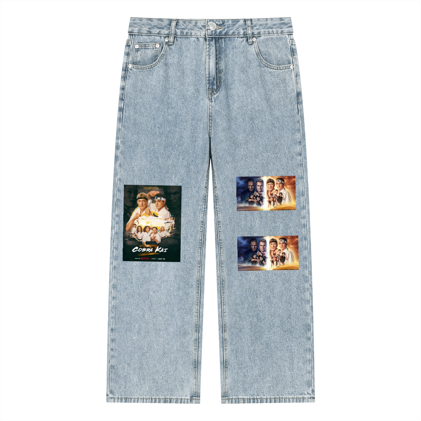 Light blue jeans with graphic patches on a white background