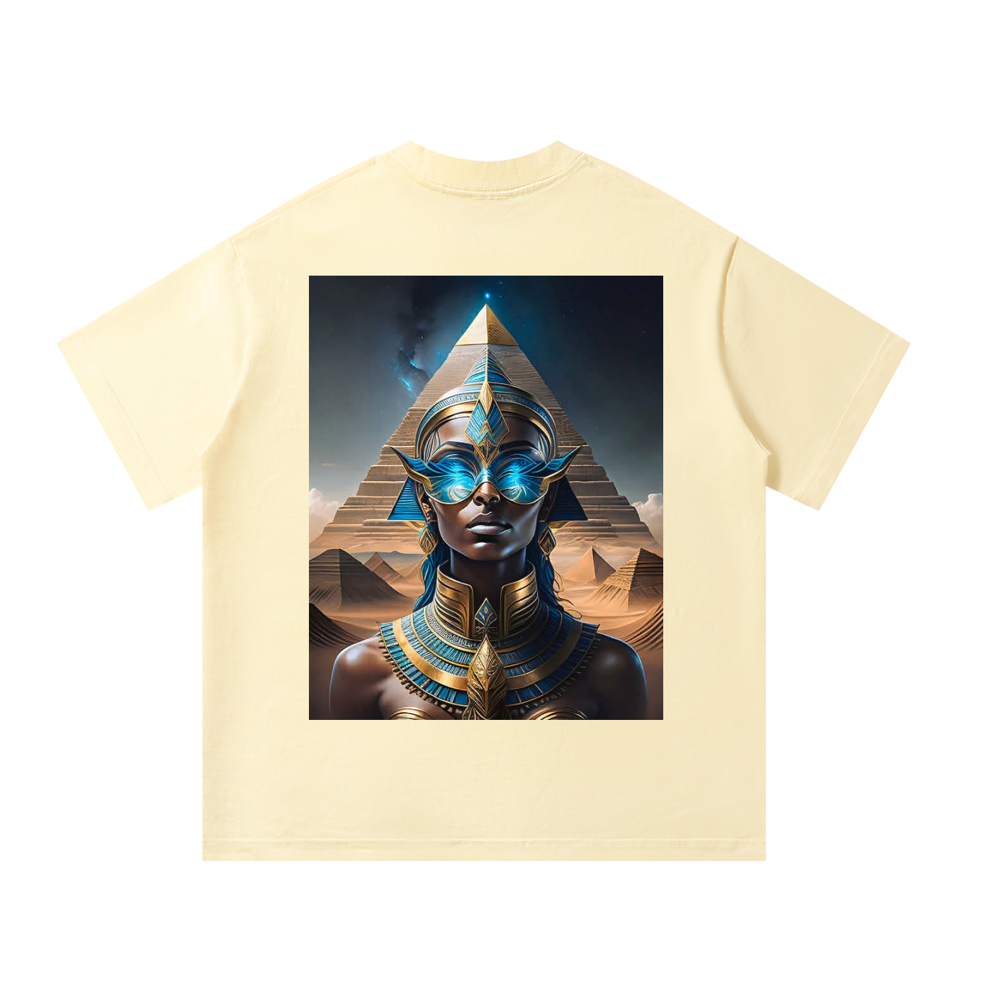 Beige t-shirt with a graphic of an Egyptian-themed design featuring a pyramid and a person in ornate attire.