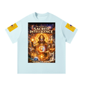 A light blue short-sleeve t-shirt with a large, detailed graphic print on the front reading 'THE RETURN OF SACRED INTELLIGENCE' and featuring a glowing, cosmic deity illustration. The sleeves have small yellow graphic patches.
