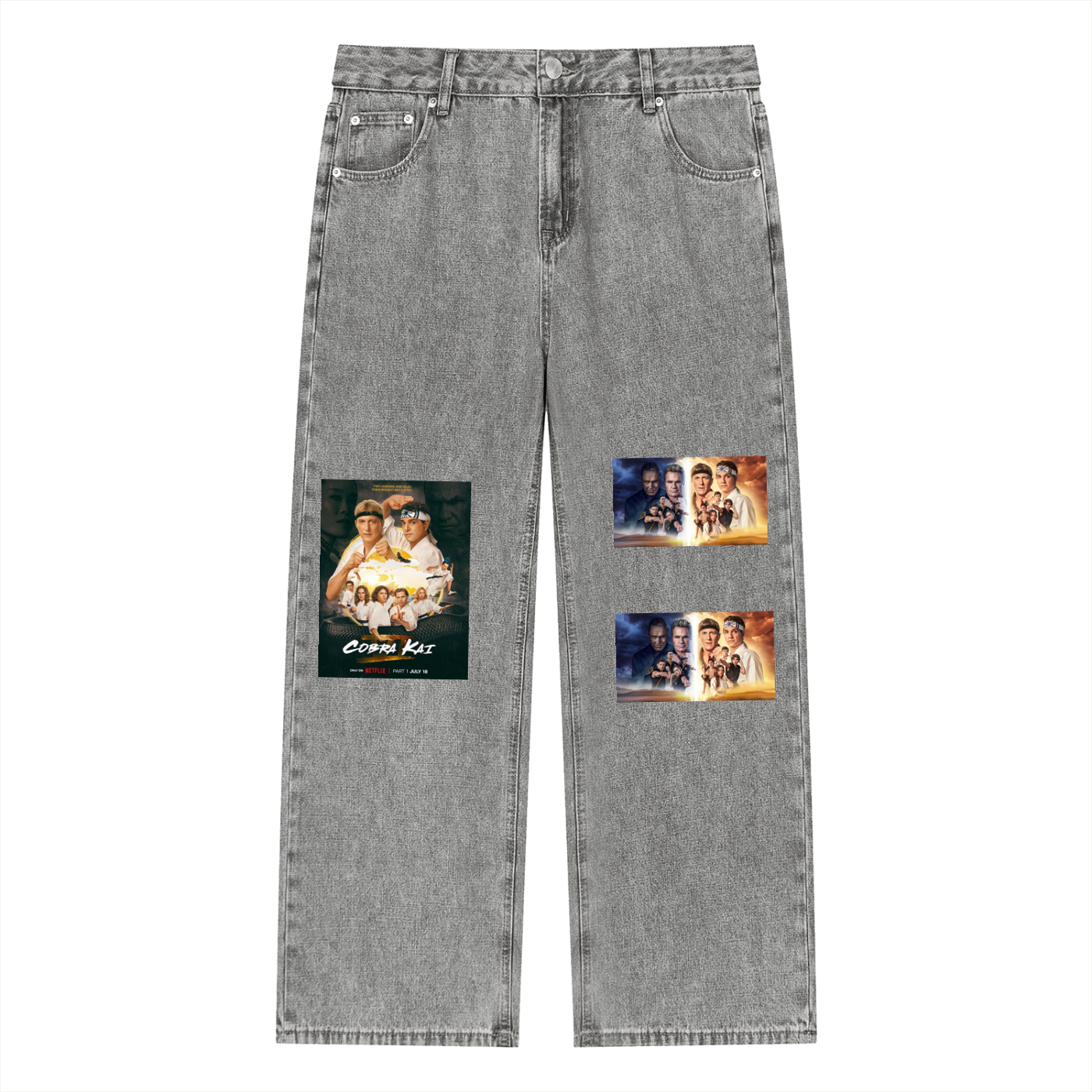 Gray jeans with graphic patches on a white background