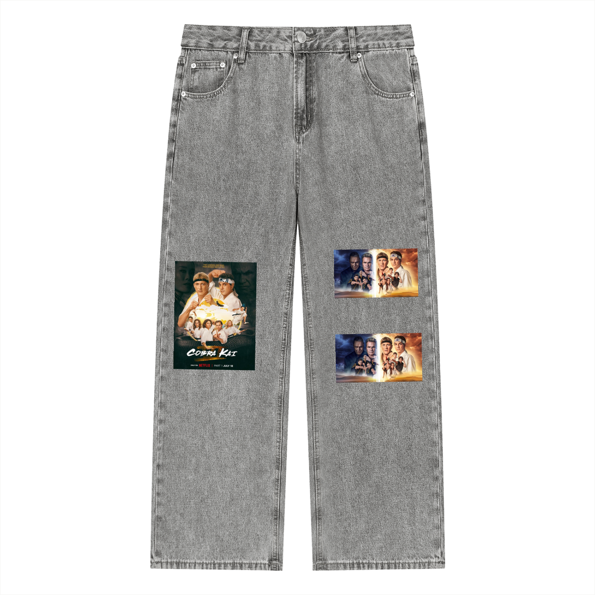 Gray jeans with graphic patches on a white background