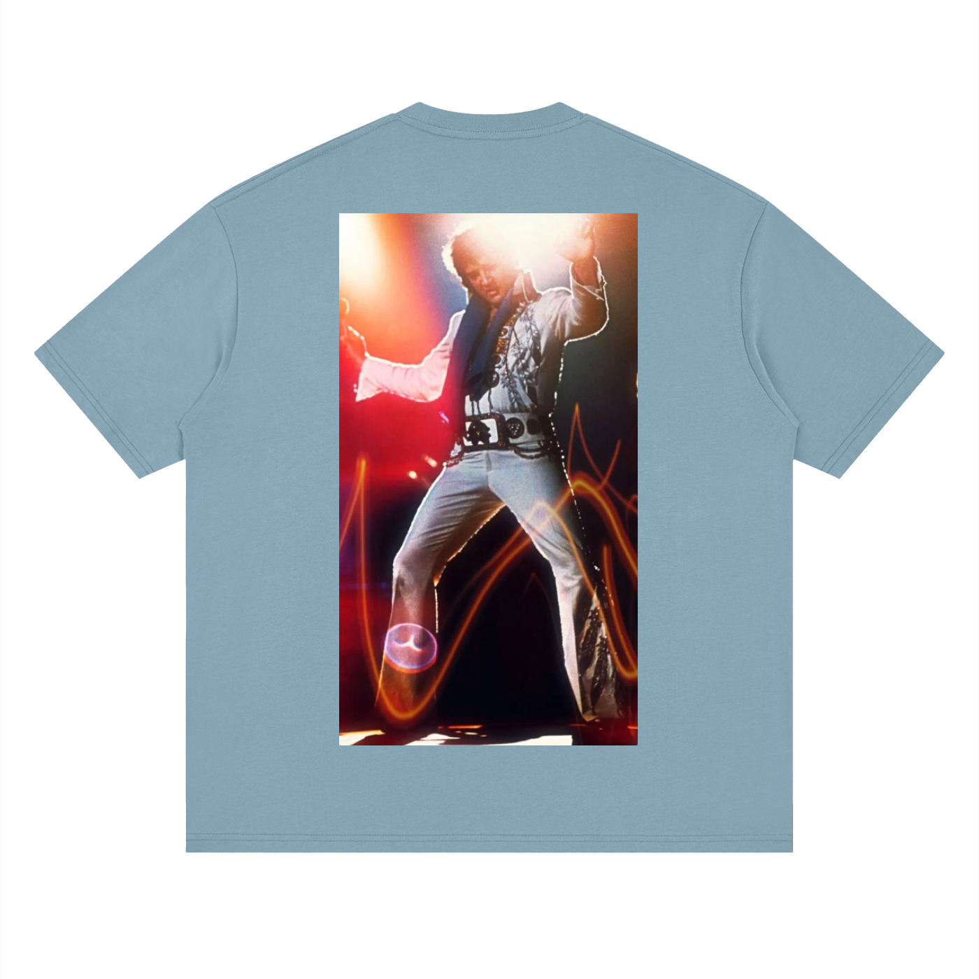 Light blue t-shirt with a graphic of a person in a dynamic pose on the back