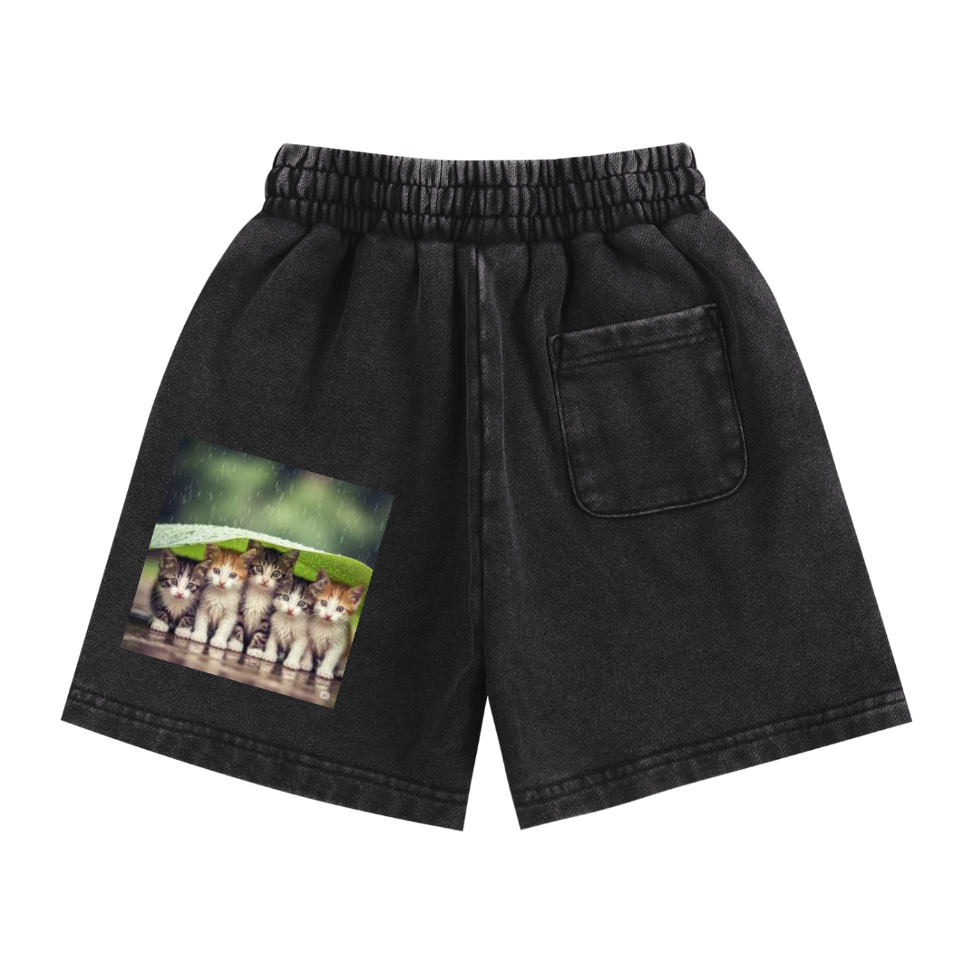 Black shorts with a pocket featuring an image of four cats on a white background