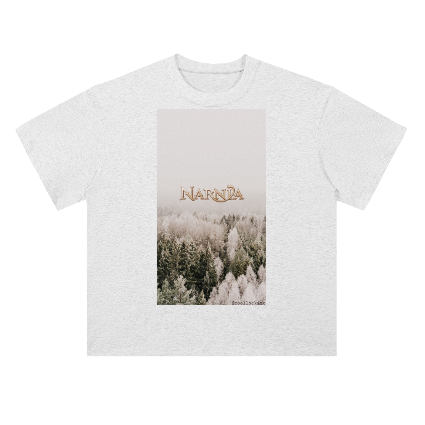White t-shirt with a printed design of a snowy forest and 'Narnia' text on a white background