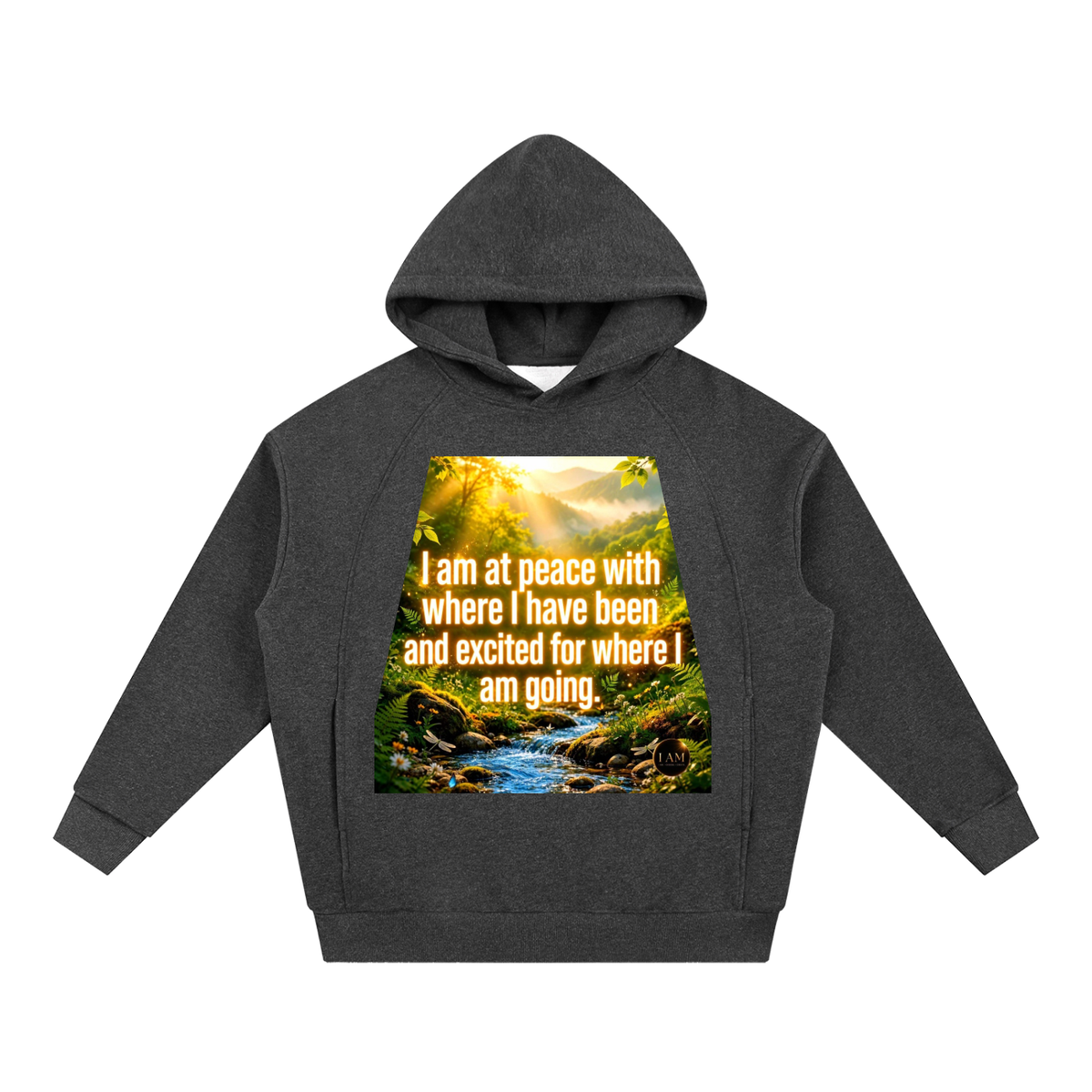A dark gray heather pullover hoodie with a front graphic print showing a scenic forest stream and a golden sunrise, overlaid with the text 'I am at peace with where I have been and excited for where I am going.'.