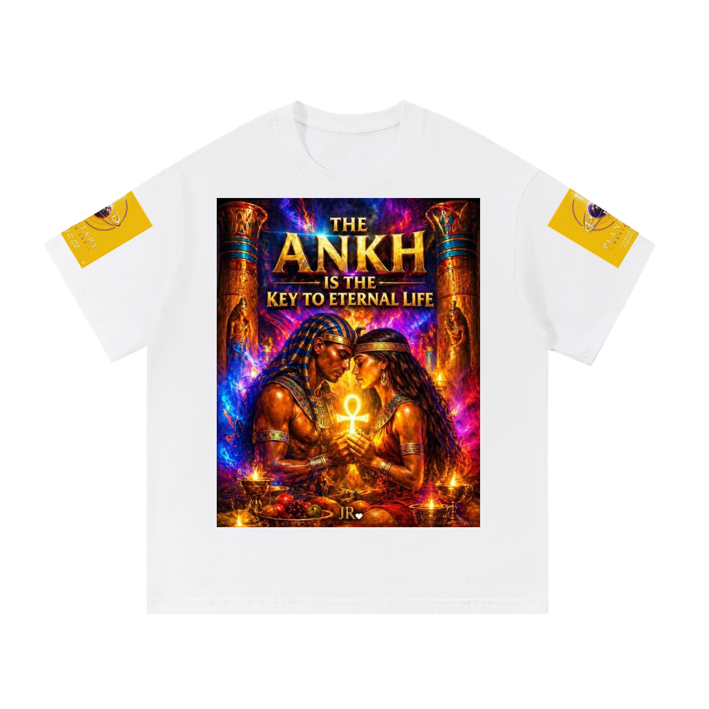 A white short-sleeve t-shirt with a large, colorful graphic print on the front depicting an Egyptian scene with the text 'THE ANKH IS THE KEY TO ETERNAL LIFE'. The sleeves feature yellow patches with black eye illustrations.