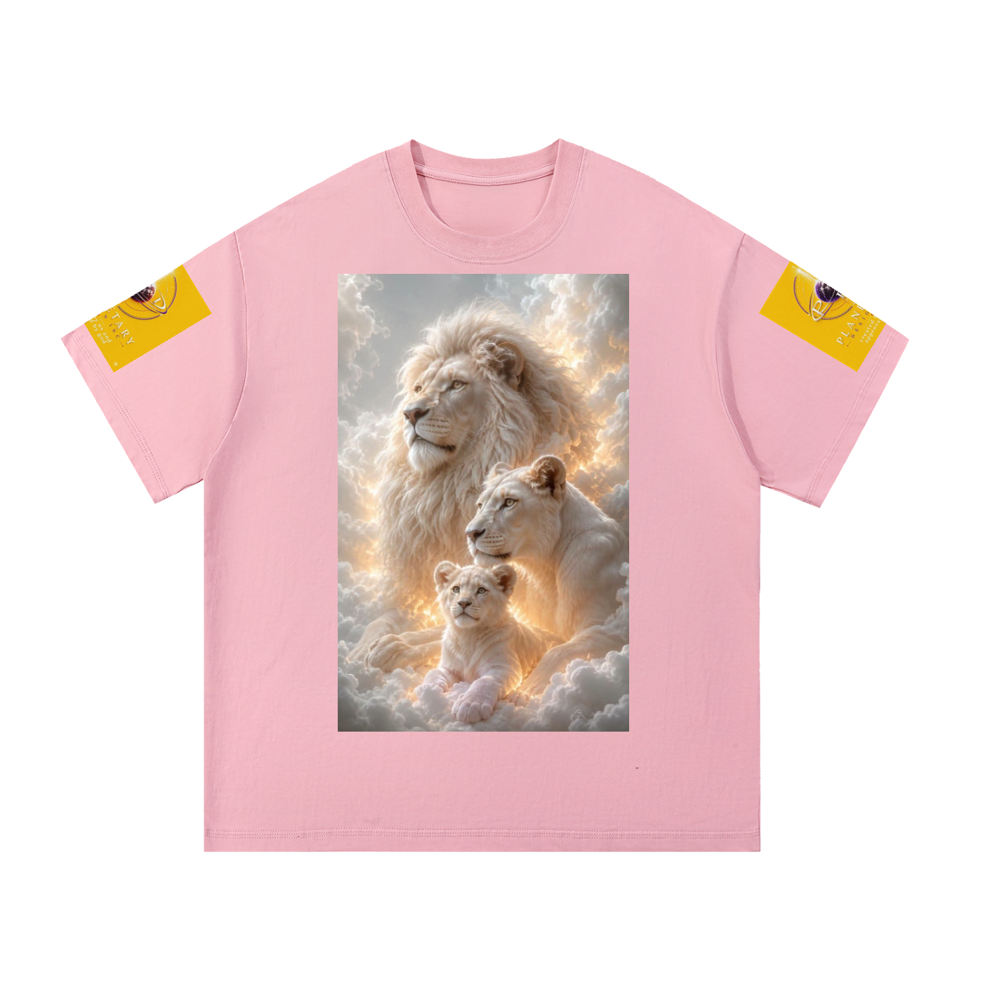 A light pink short-sleeve t-shirt with a large graphic print of a lion, lioness, and cub in the clouds on the front. The left and right sleeves feature small yellow graphic patches with a cartoon character.