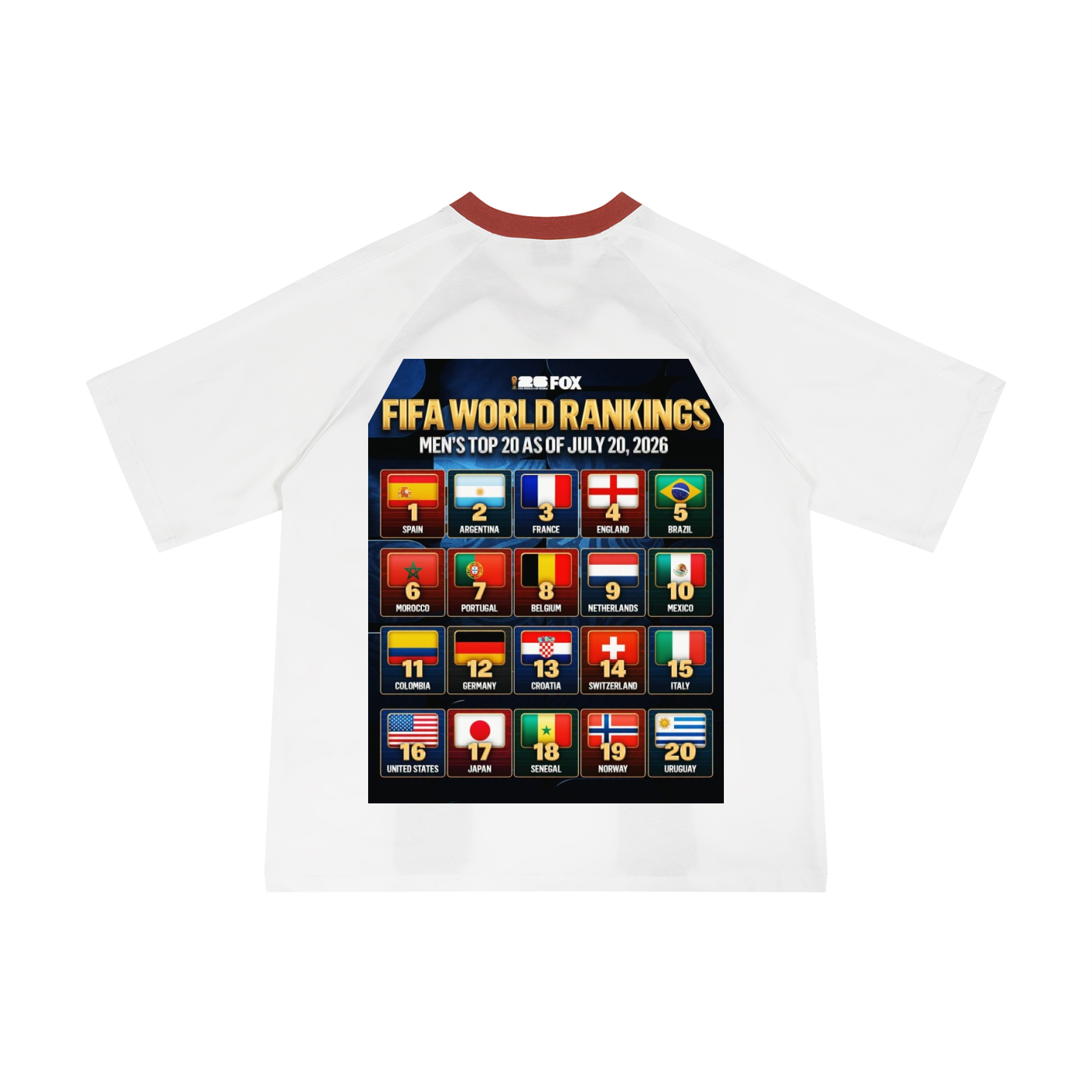 A white raglan-style t-shirt with a red collar, featuring a large graphic print on the front. The graphic displays FIFA World Rankings for men's football from July 20, 2025, with various national team flags and their corresponding positions.