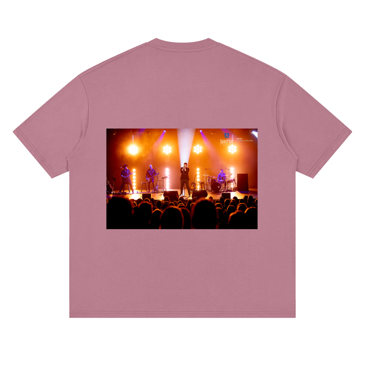Pink t-shirt with a printed design of a concert on the back